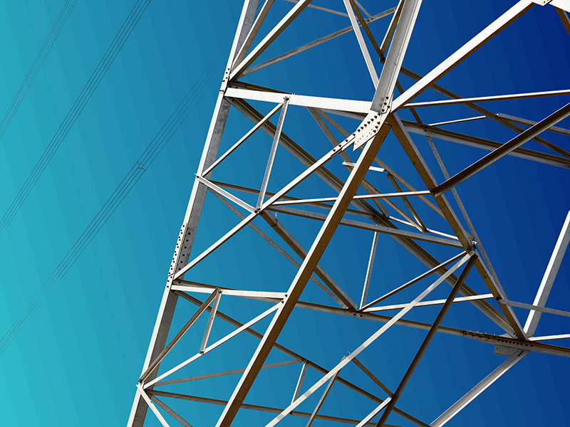 The foot of an electricity pylon against a turquoise gradient background.