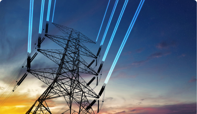 An electricity pylon set against a darkening skyline, with blue glowing wires.