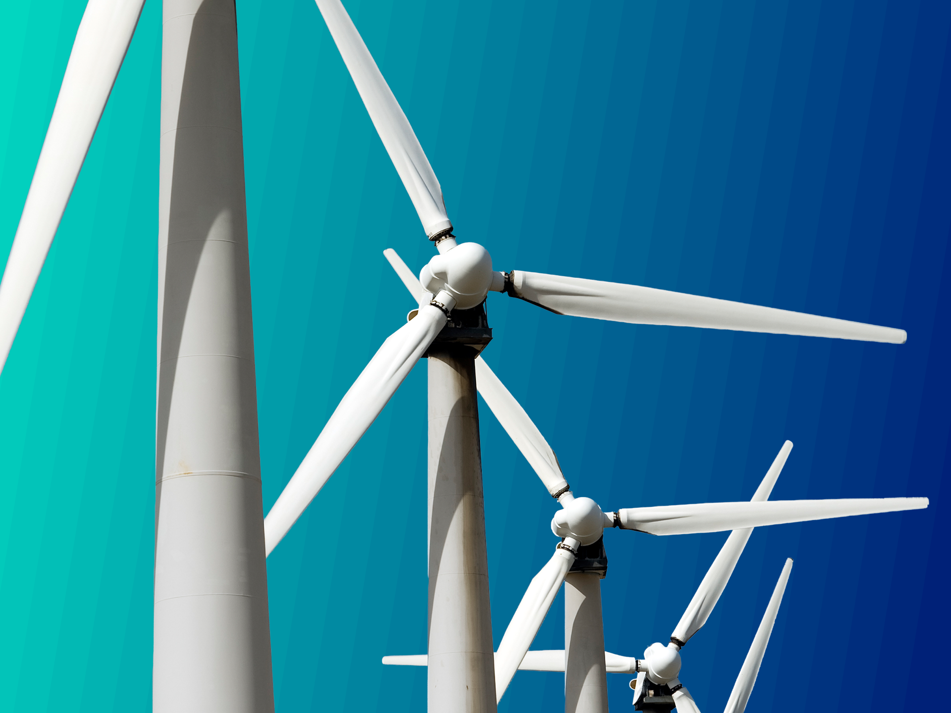 A close up of a row of wind turbines against a green gradient background.
