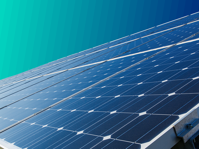 Solar panel on green background